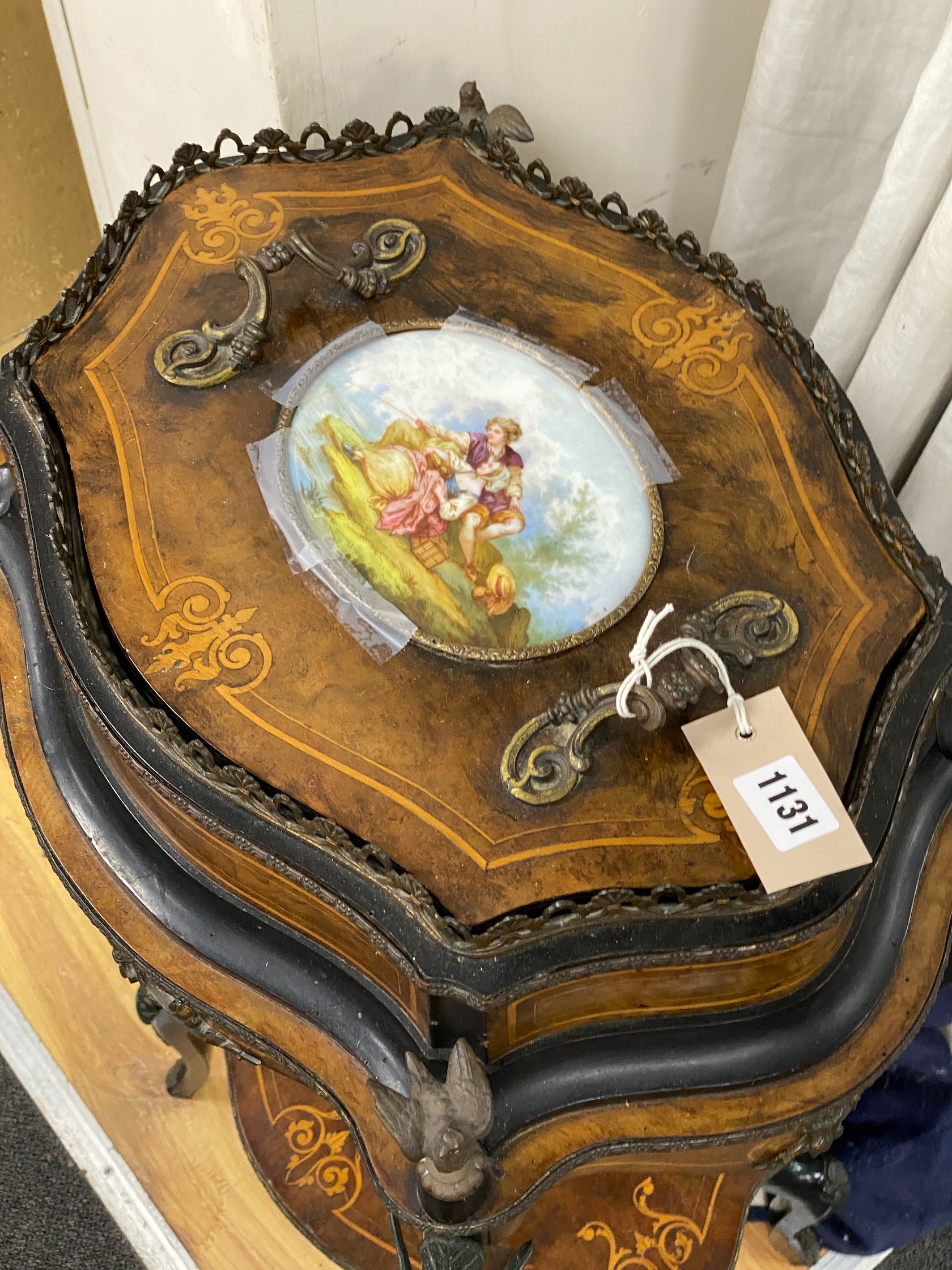 A 19th century French walnut and marquetry porcelain mounted two tier table, width 48cm, depth 35cm, height 88cm